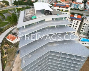 "Hotel rooftop with sea view - Luxury apartments for sale in Becici, Montenegro. Real estate on the first line, elite accommodations with panoramic sea views.