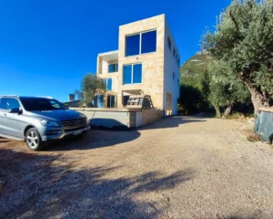 Large house with natural stone and sea view for sale in Sutomore, Montenegro, with pool