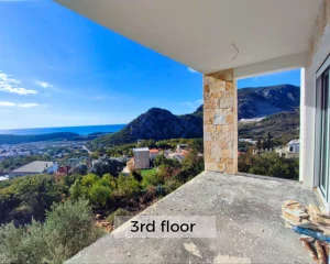 Large terrace with a natural stone facade and sea view in Sutomore, Montenegro.
